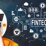 Cryptocurrency fintech theme with person using a laptop
